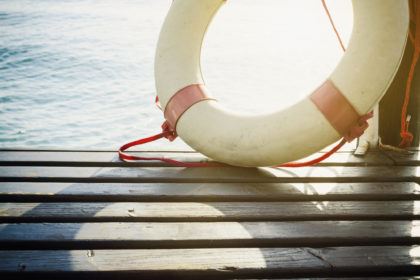 A life preserver sitting on a dock