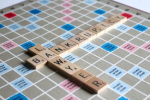 Scrabble tiles spelling out Bankruptcy Lawyer