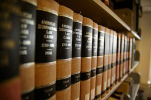 a bookshelf filled with law books