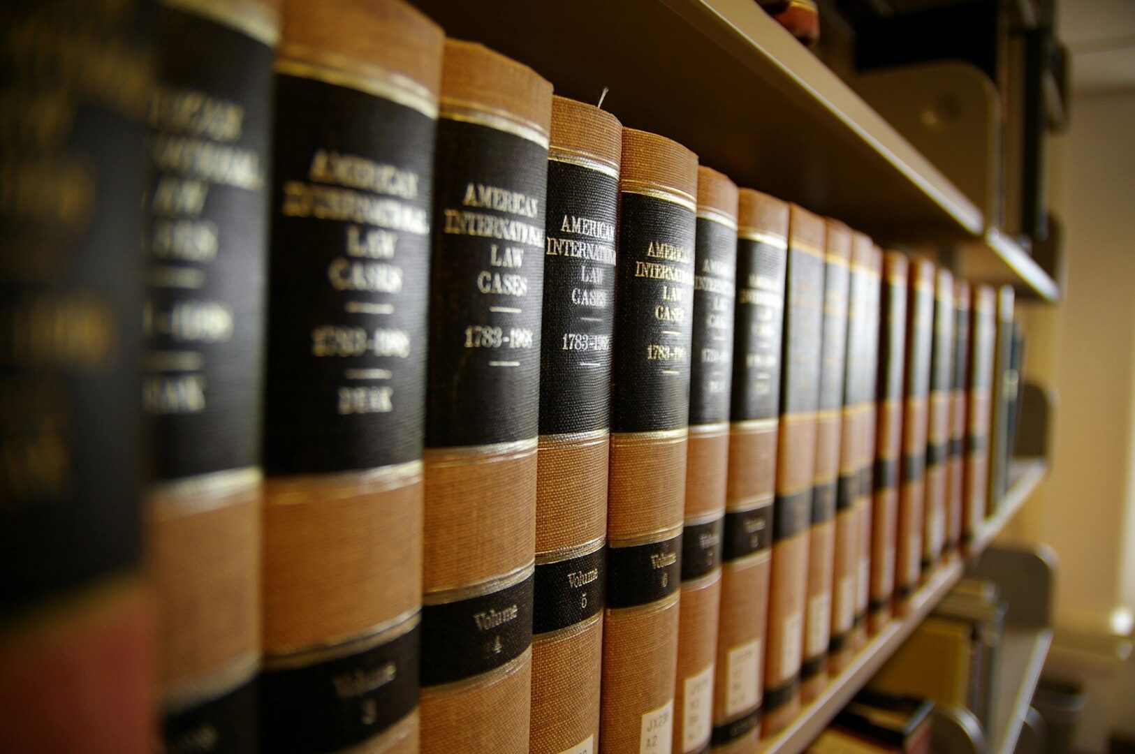 a bookshelf filled with law books
